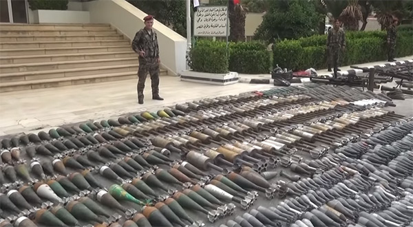 Militant arms handed over to the Syrian government 